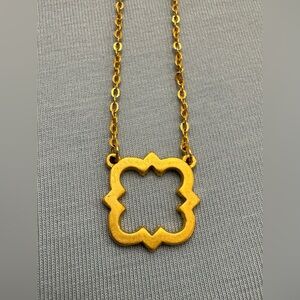 Quatrefoil Gold Tone Pendant Necklace